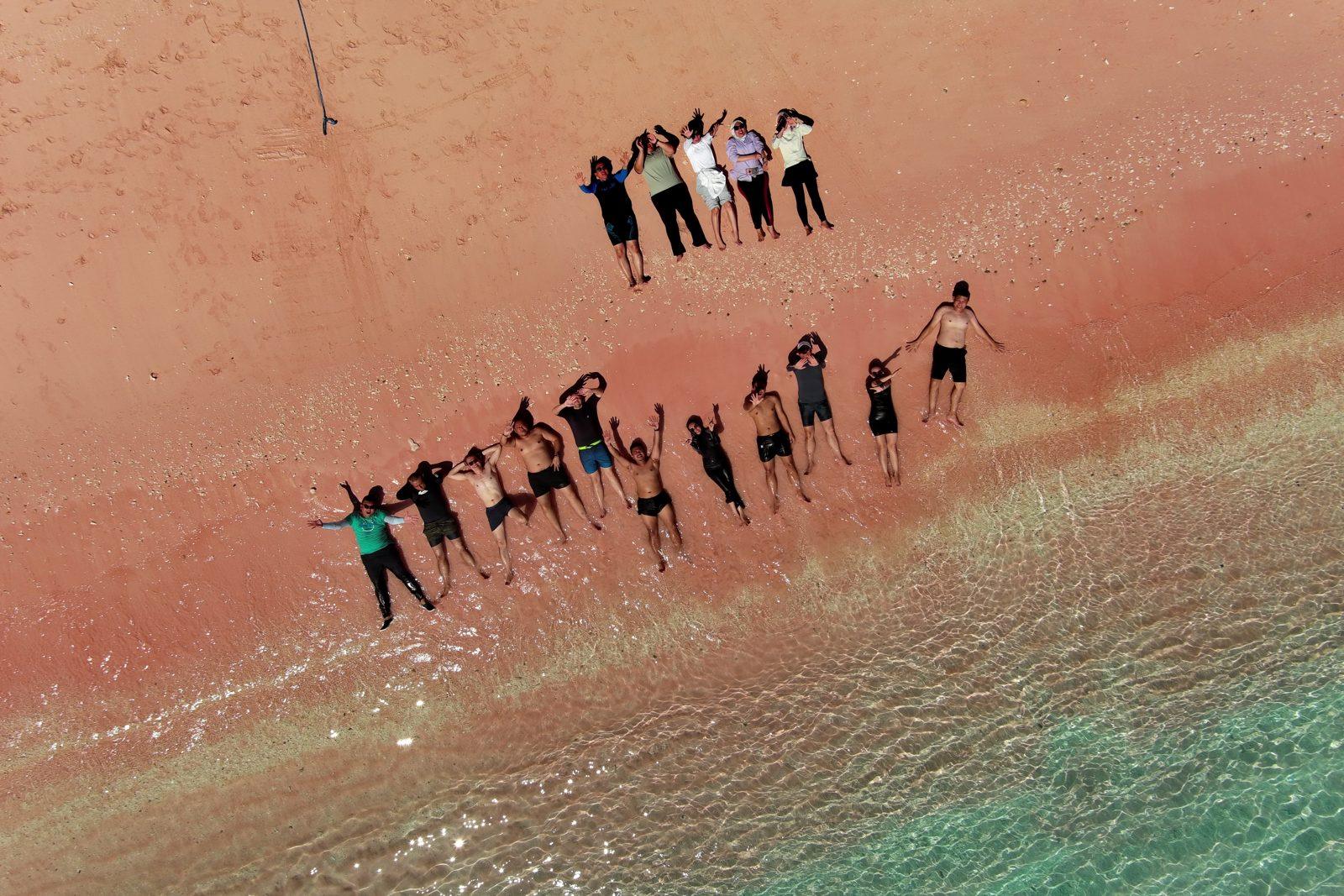 Pink Beach – Aerial, large group formation on pink sand (Real photo from a Komodo Explorer trip)